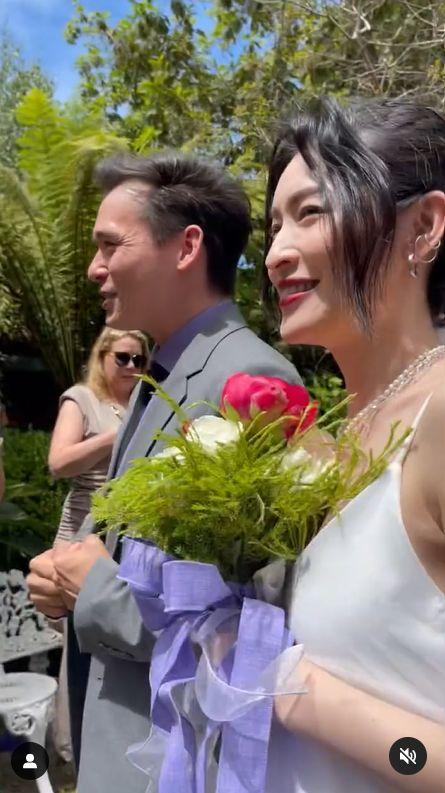 倪安东扶正小三「低调飞美办婚礼」 热吻画面曝!管罄披宽松白纱